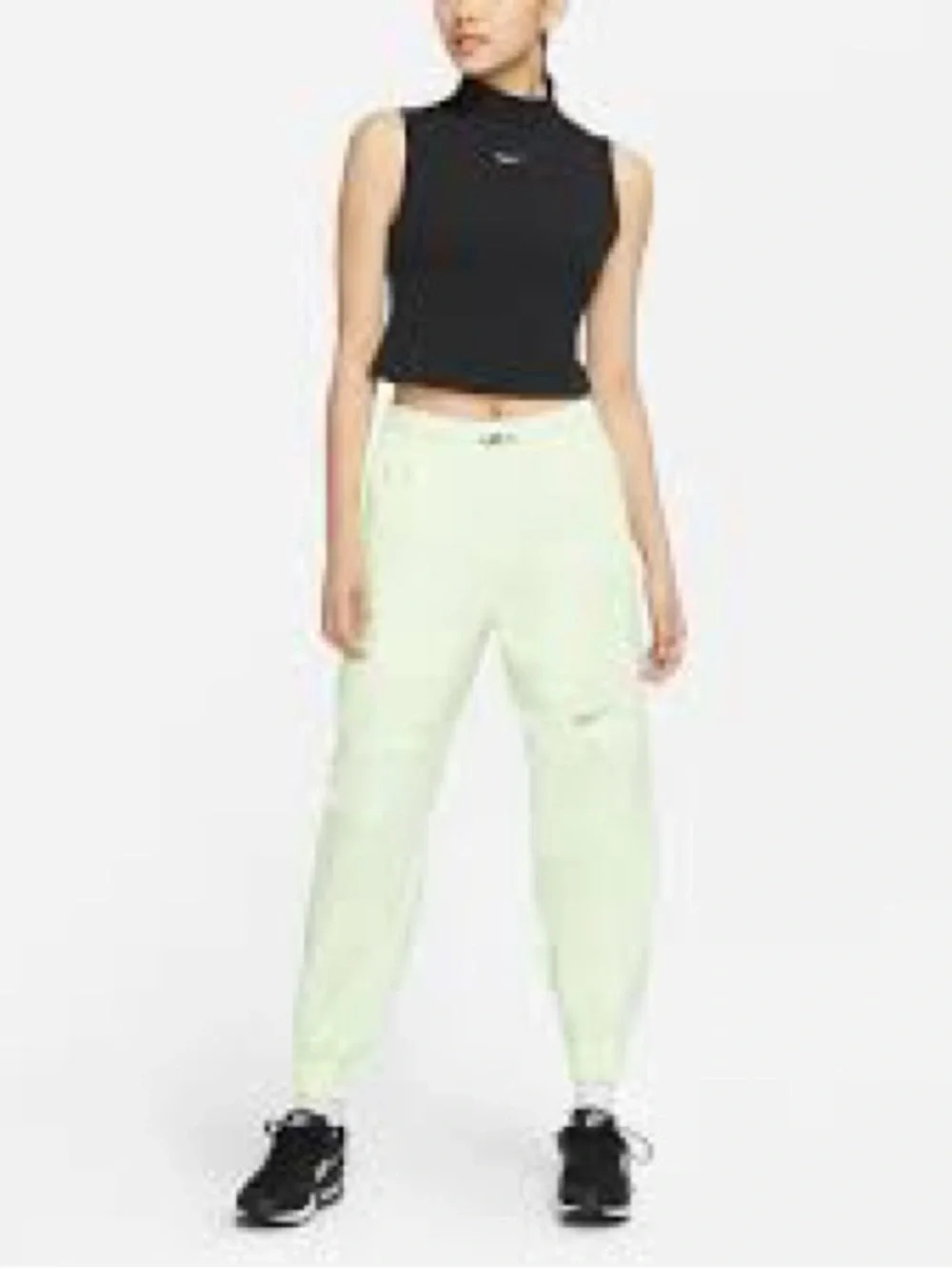 Nike Women's Sportswear Woven Pants in a bright neon green/yellow XS